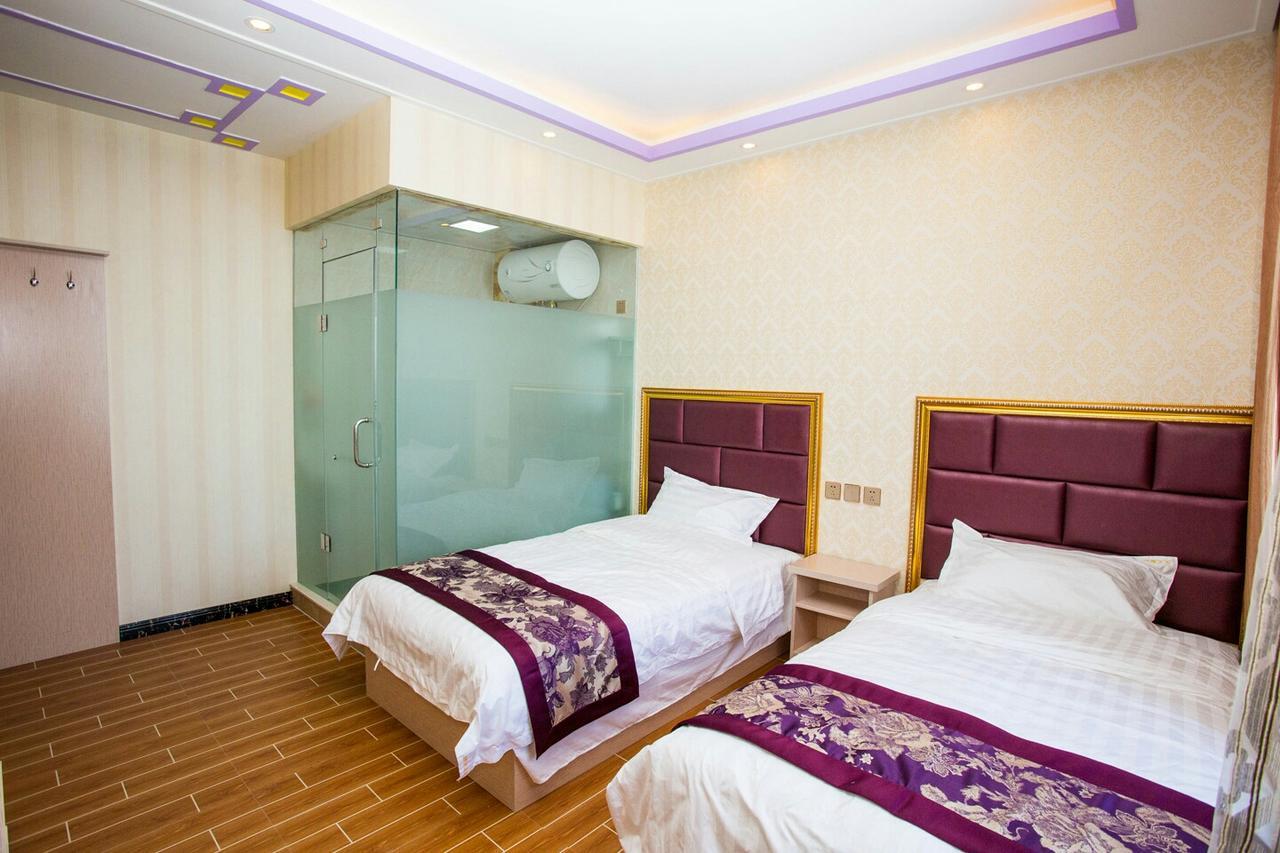 Отель 哈尔滨机场东方红运宾馆 Экстерьер фото
